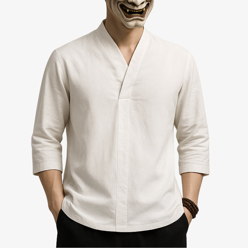 Person wearing a white zen t-shirt with a white mask on a white background