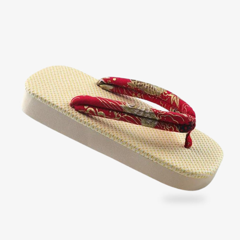 Lightweight zories sandals, ideal for beach wear and casual summer days. The hanao strap is red color with japanese pattern printed. The japanese is made with natural material