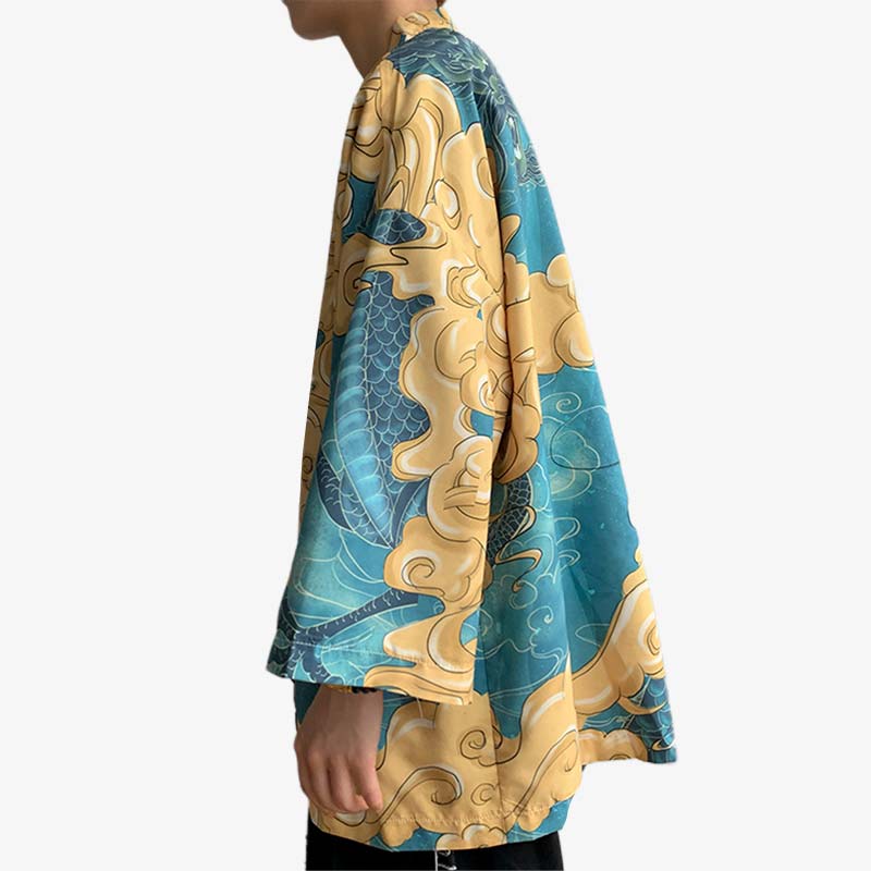 A man in profile is wearing a pretty Haori Harajuku Japan kimono in yellow and blue.