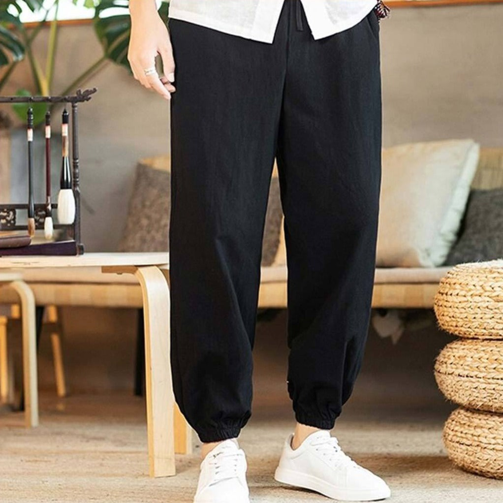 a person wearing a black-japanese-style-wide-pant in a Japandi house