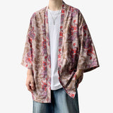 A Japanese man is wearing a dragon haori jacket. The kimono jacket is beige and is worn open without a belt.
