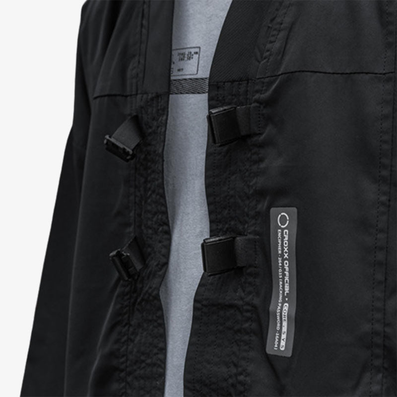 For a black streetwear look from harajuku, slip on a Japanese techwear jacket.