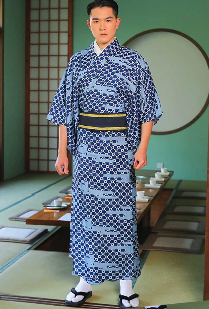 a man is dressed with a kimono for man Japan with an obi belt in a japanese house