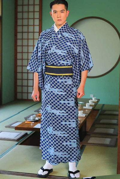 a man is dressed with a kimono for man Japan with an obi belt in a japanese house