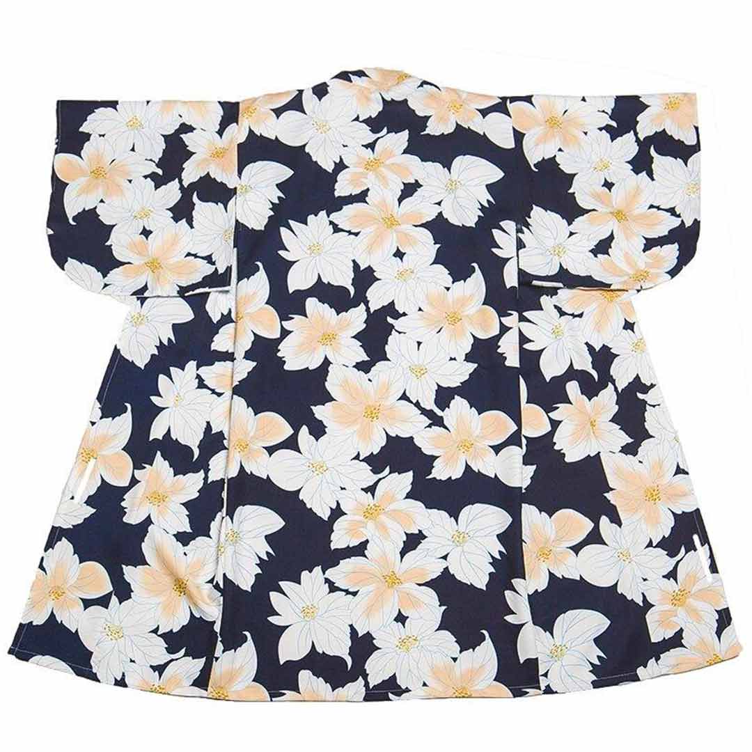 Kimono robe Japanese style featuring yellow and white Japanese flower motifs. Kimono fabrics is cotton