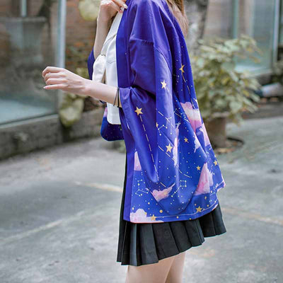 The royal blue kimono jacket features a Japanese design inspired by Kawaii style with a Maneki Neko cat, stars and the moon