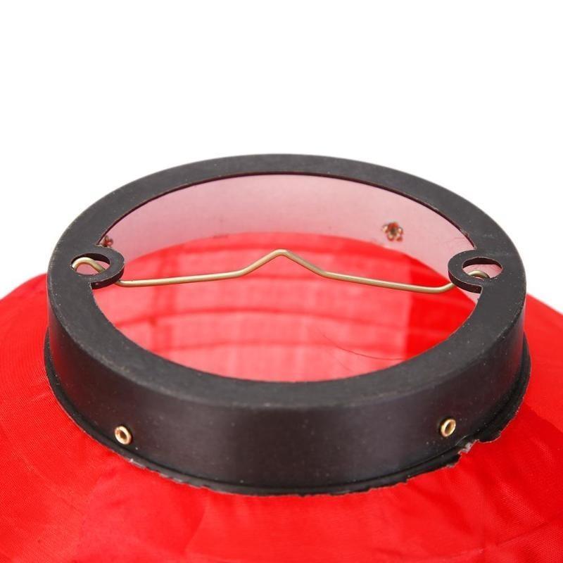 a black and red traditional japanese lantern fixture